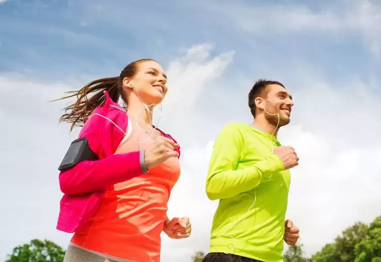 Man and woman running to get in good shape